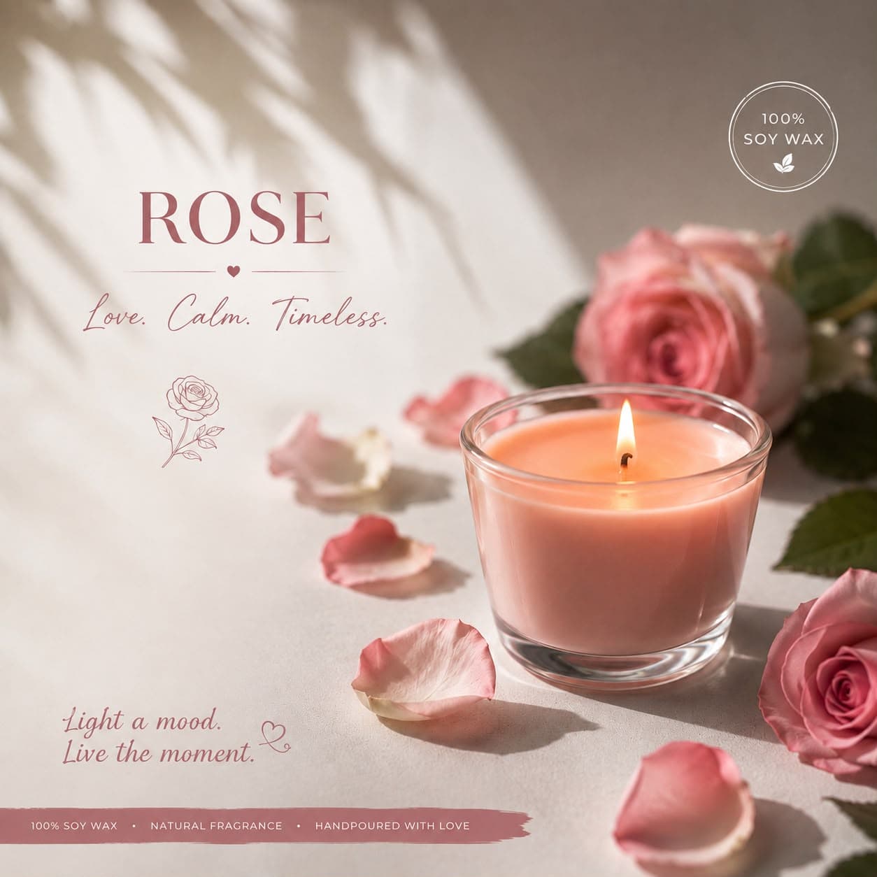 A blush candle surrounded by soft pink roses